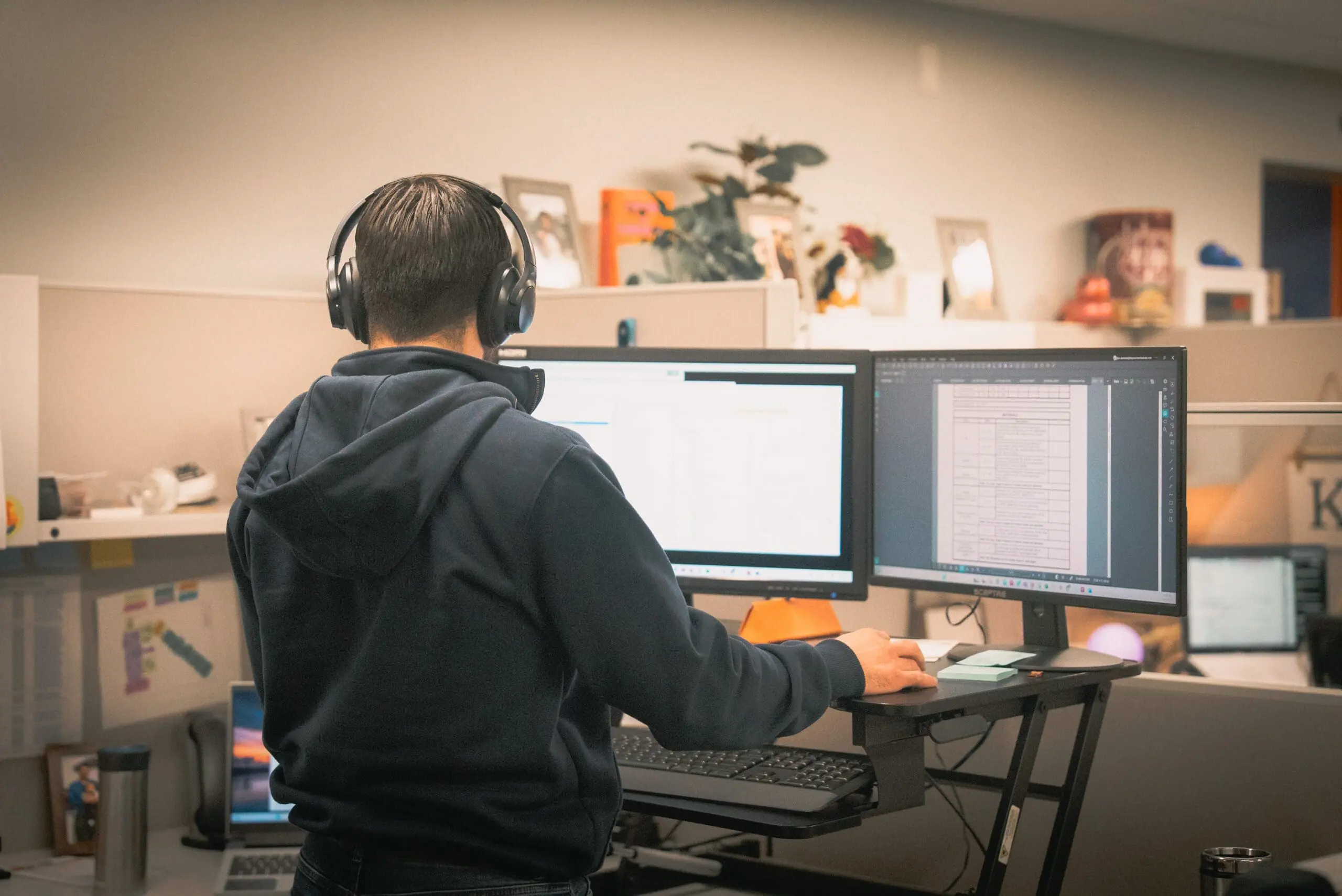 DePue Mechanical engineering team reviewing 3D model on computer