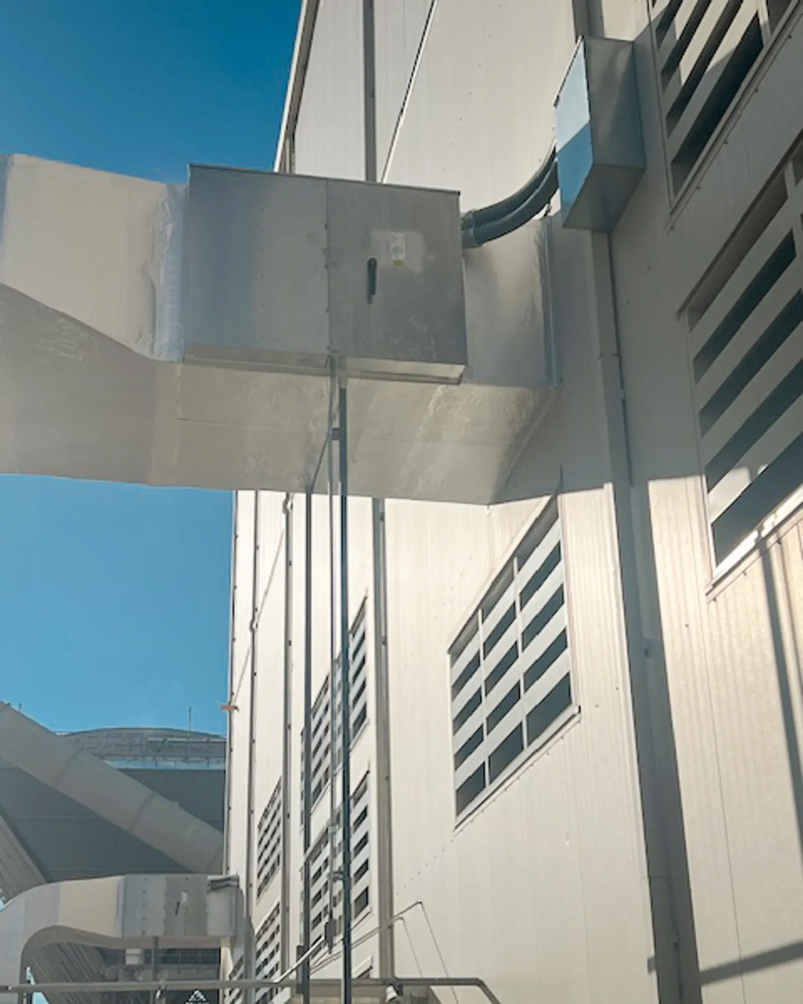 DePue team forming stainless steel ductwork