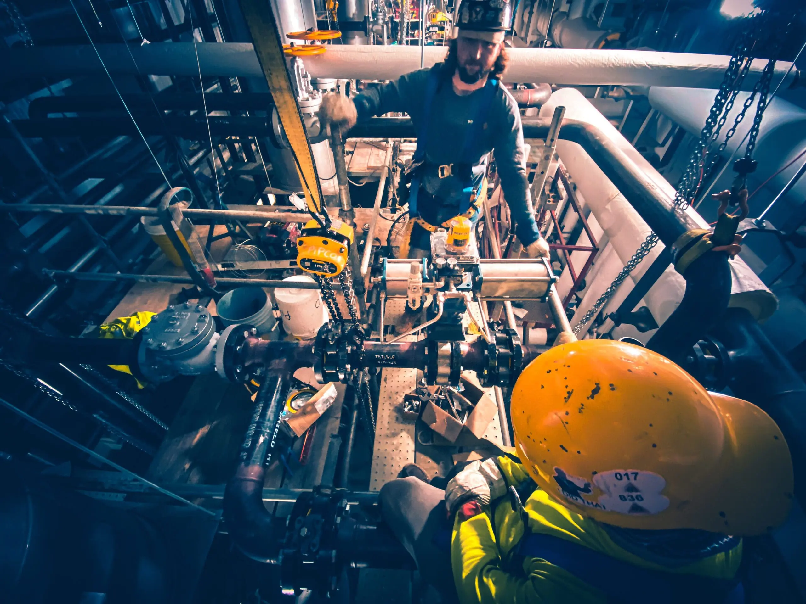 Mechanical piping subcontractor work inside an active industrial facility