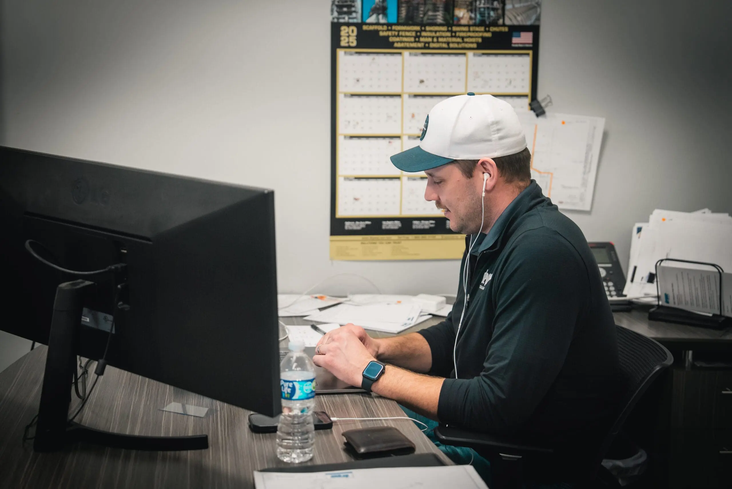 Project Manager reviewing permits