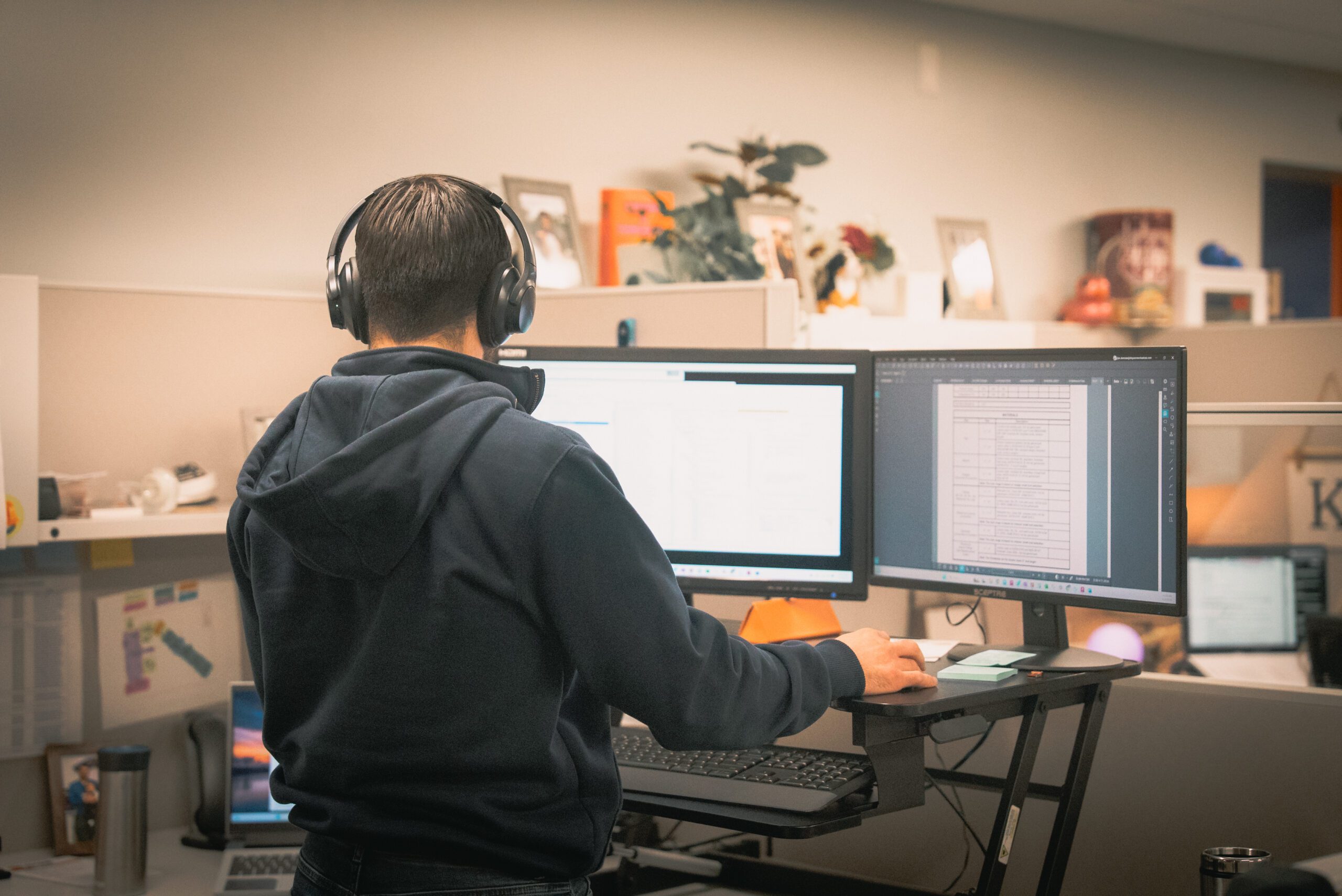 DePue Mechanical engineering team reviewing 3D model on computer