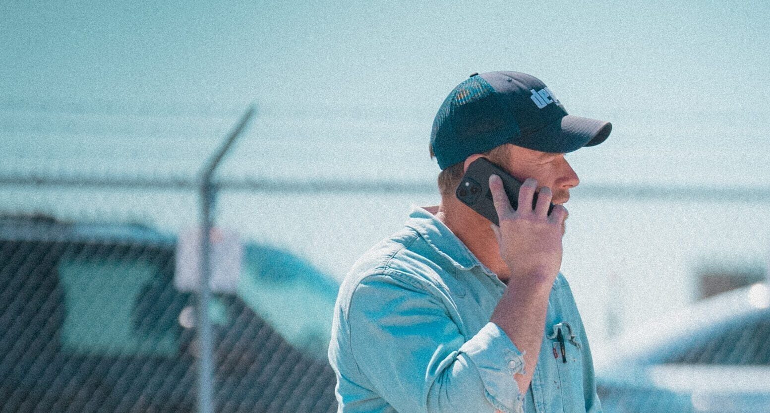 Foreman on a phone call with a client